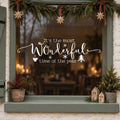 Wonderful Time of the Year Christmas Window Sticker in white on a sage green framed window decorated for Christmas