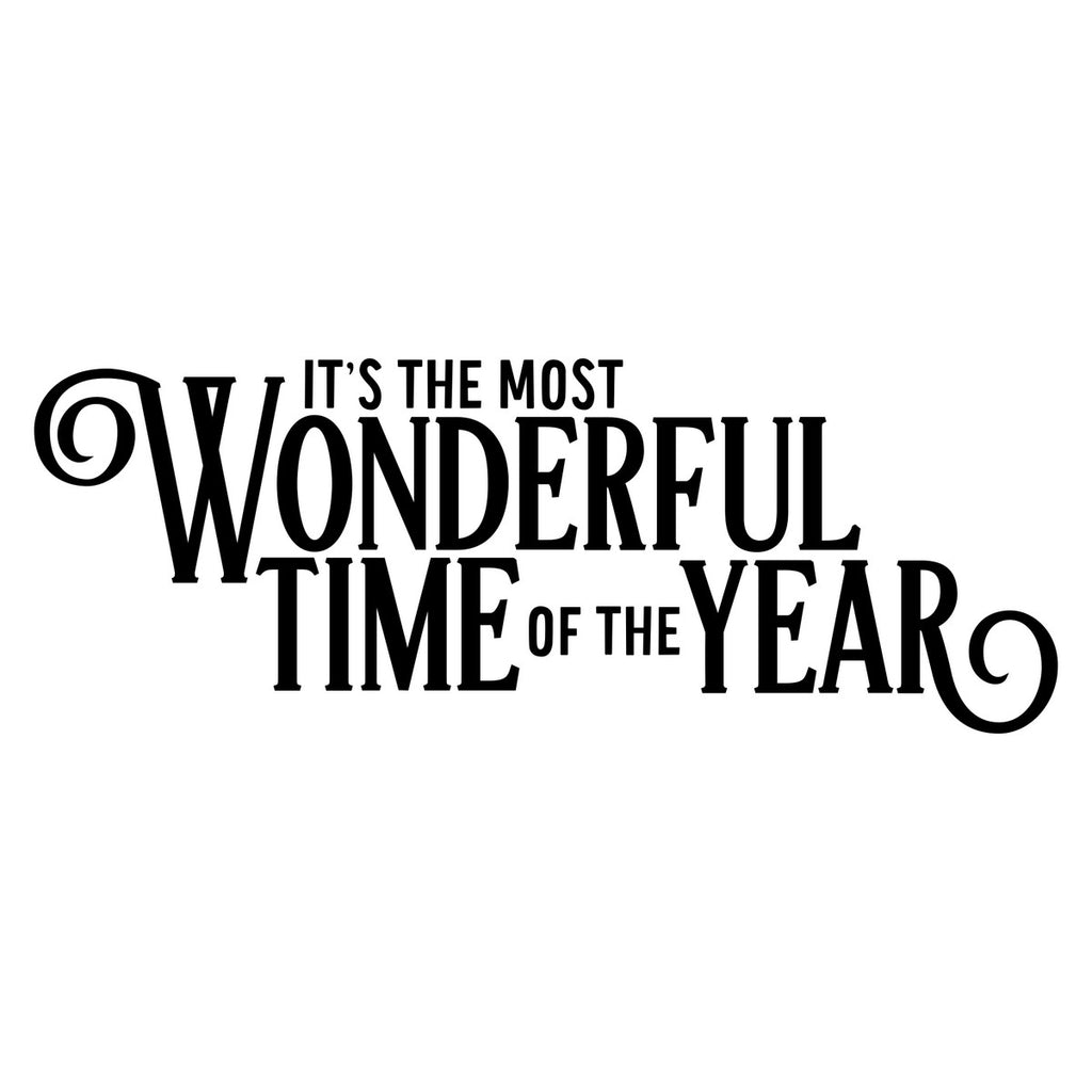 Most Wonderful Time of the Year Christmas Window Sticker in black on a plain white background, showing It's the Most Wonderful Time of the Year in bold vintage-style lettering with decorative curled flourishes
