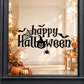 Pumpkin Happy Halloween window sticker showing hand-lettered Happy Halloween text with a jack-o’-lantern, bat and hanging spider, black vinyl on a light shop window with a dark charcoal frame