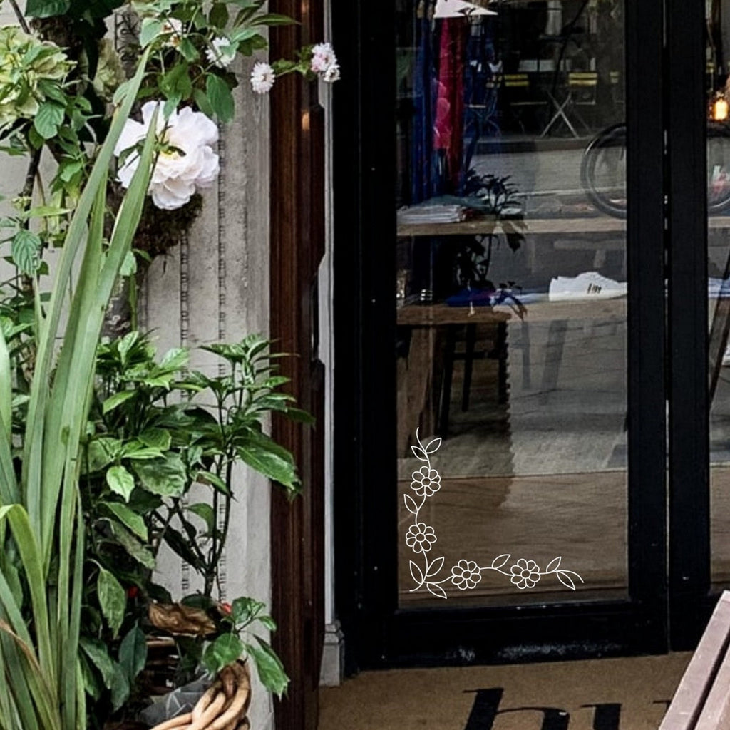 Floral Vine Corner Window Sticker for Shops & Homes fitted to a shopfront glass door