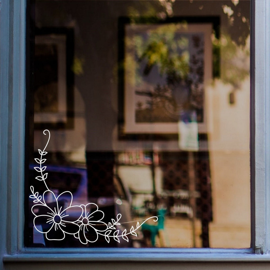 Flower & Leaf Corner Window Sticker for Shops & Homes displayed on a shop window