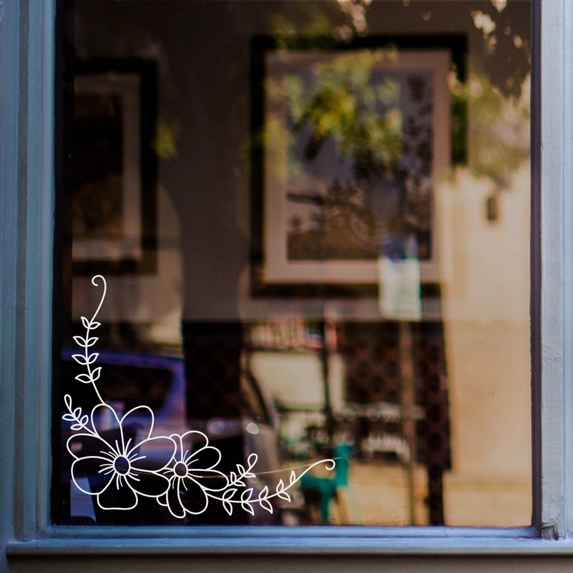 Flower & Leaf Corner Window Sticker for Shops & Homes displayed on a shop window