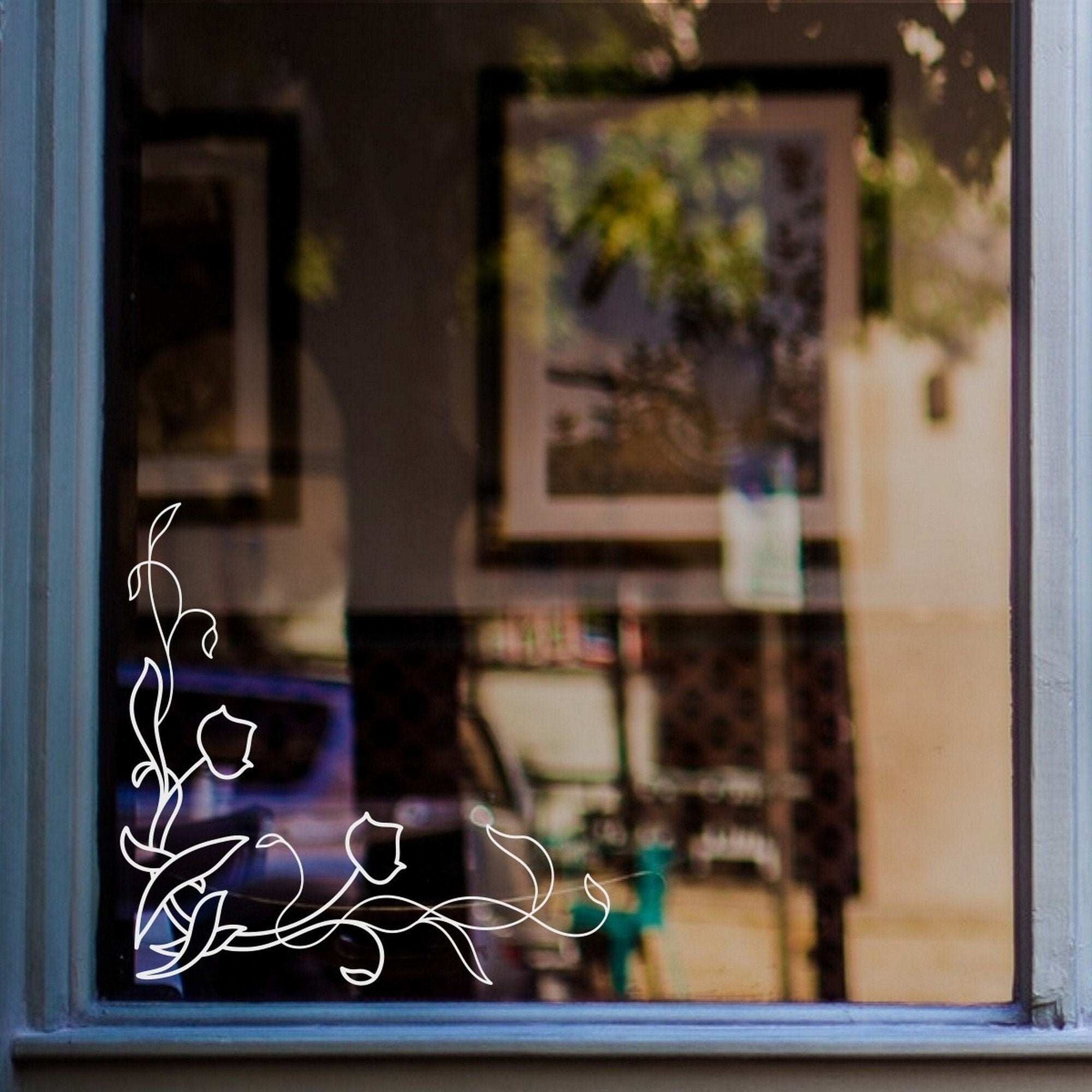 Leaf & Flower Corner Window Sticker for Shops & Homes displayed on a shop window