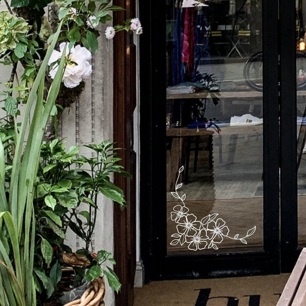 Floral Blossom Corner Window Sticker for Shops & Homes fitted to a shopfront glass door
