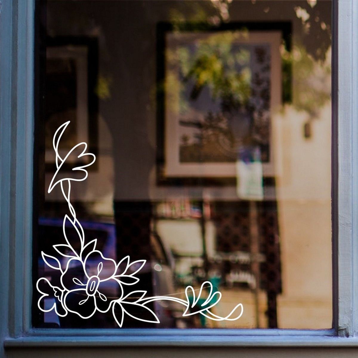 Floral Window Sticker for Shops & Homes displayed on a shop window