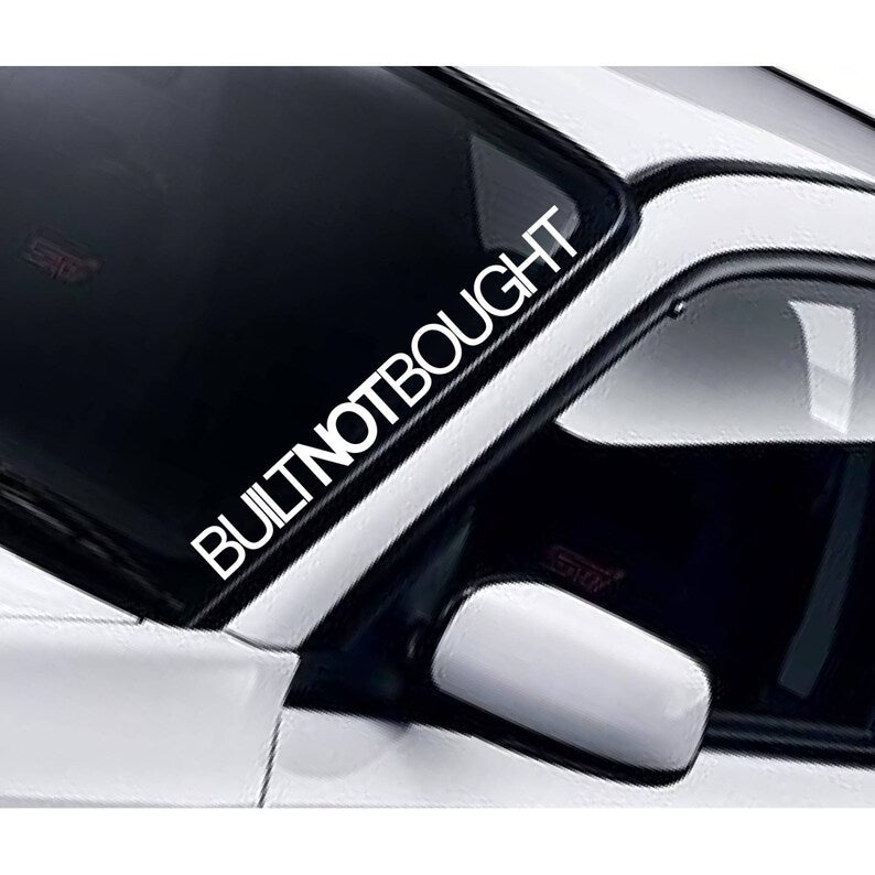 Built Not Bought white vinyl windscreen sticker fitted to a car