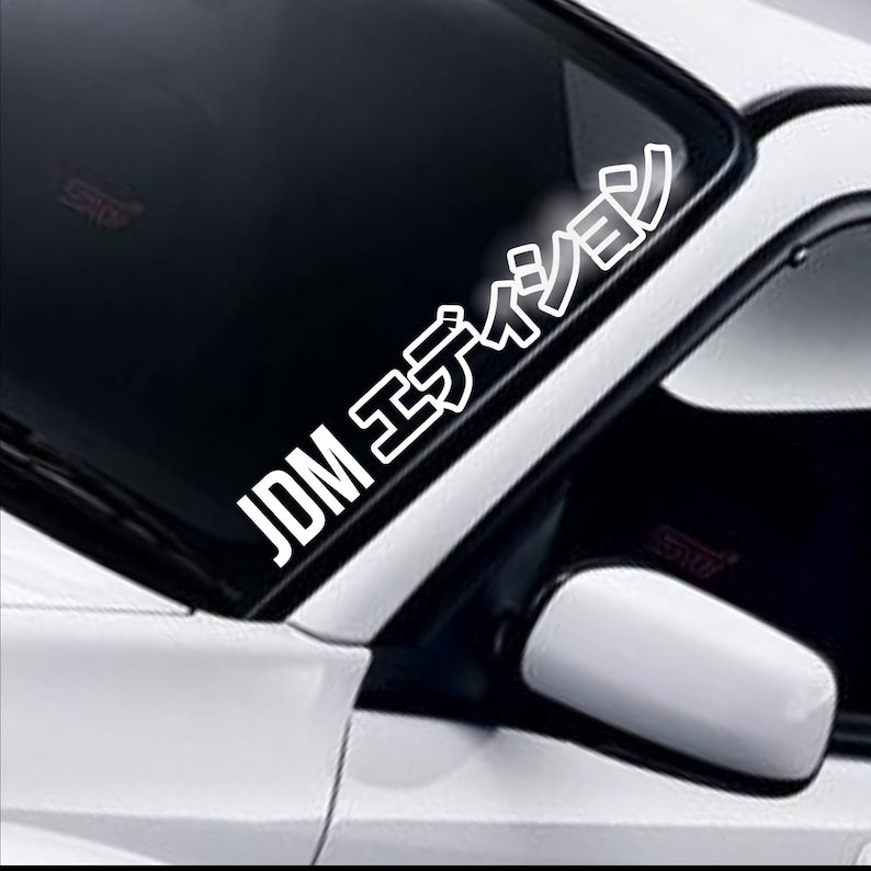 JDM Import Kanji white vinyl windscreen sticker fitted to a car