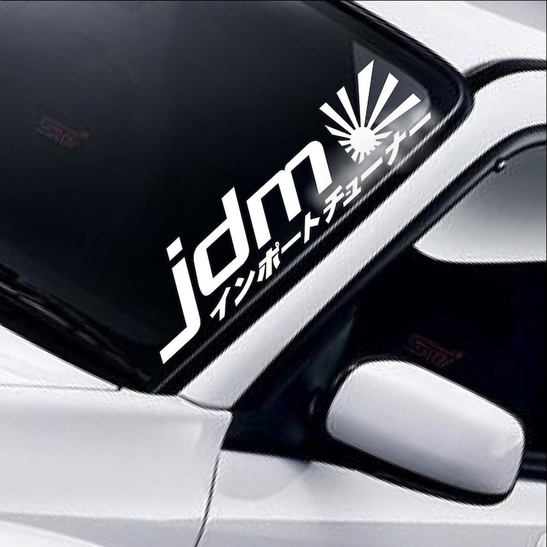 JDM Kanji Rising Sun white vinyl windscreen sticker fitted to a car