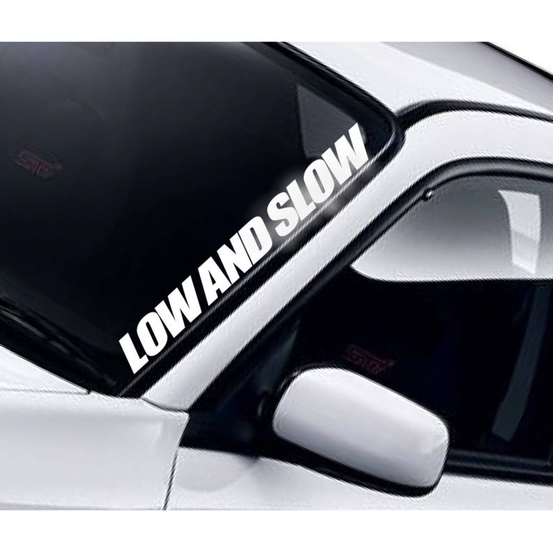 Low and Slow windscreen sticker fitted to a car windscreen