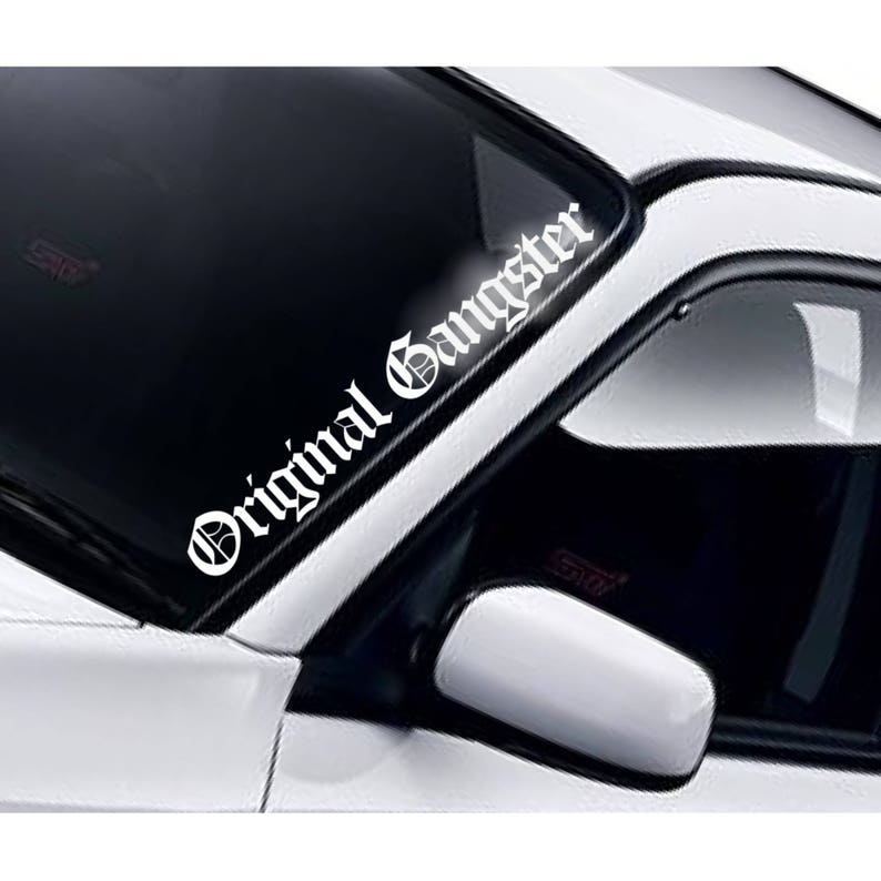 Original Gangster gothic windscreen sticker fitted to a car windscreen