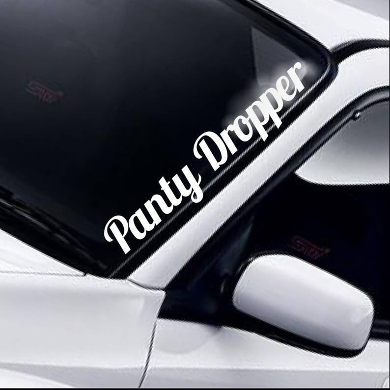 Panty Dropper windscreen sticker fitted to a car windscreen