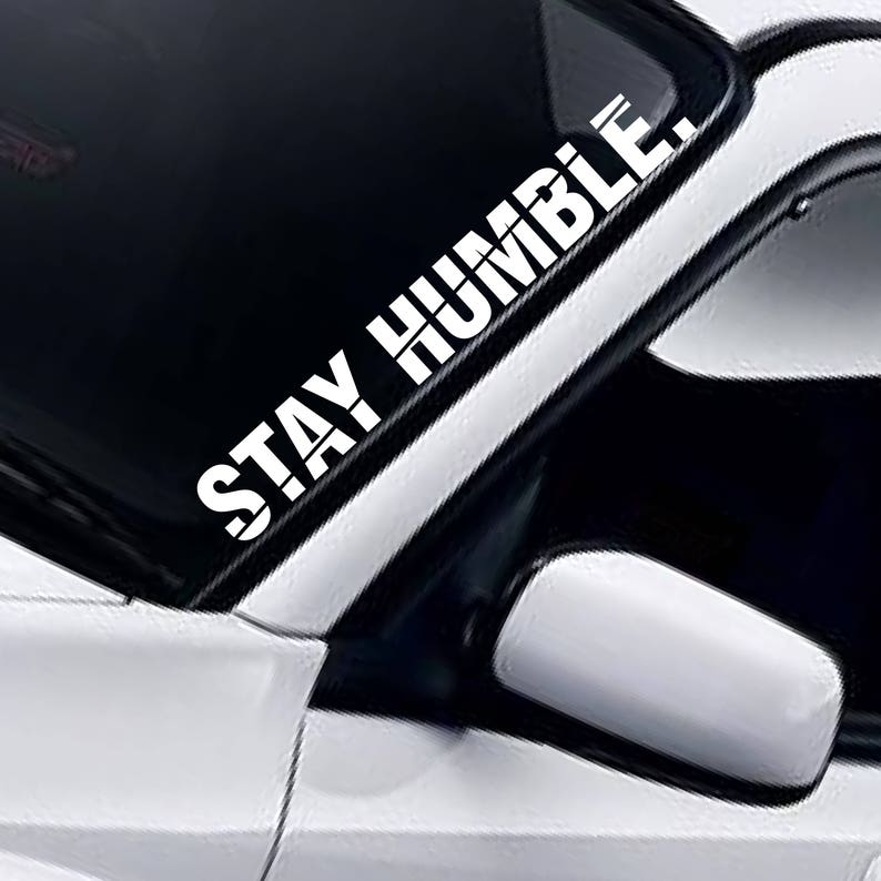 Stay Humble windscreen sticker fitted to a car windscreen