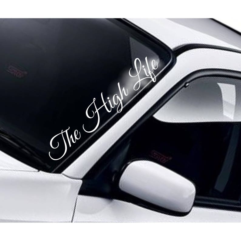 The High Life script windscreen sticker fitted to a car windscreen