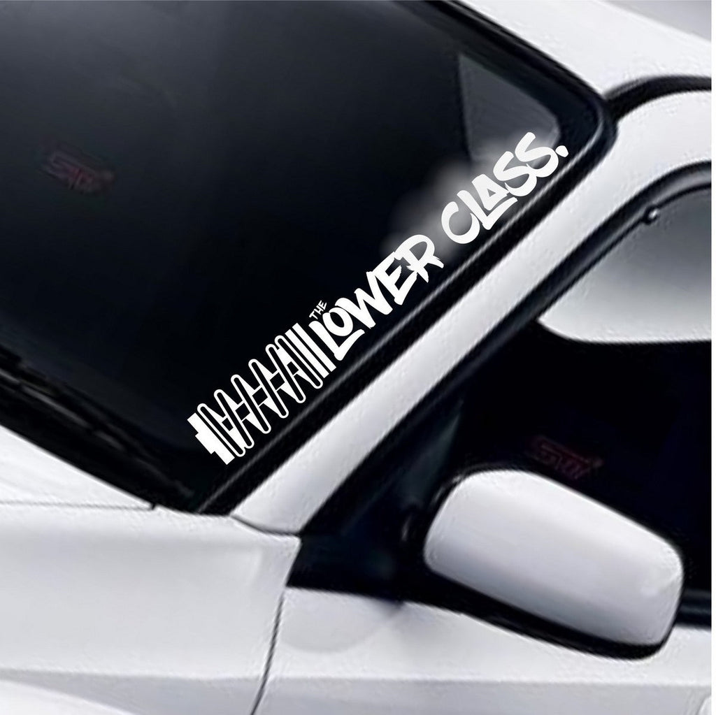 The Lower Class coil windscreen sticker fitted to a car windscreen