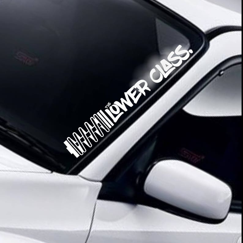 The Lower Class coil windscreen sticker fitted to a car windscreen