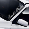 Trouble Maker script windscreen sticker fitted to a car windscreen