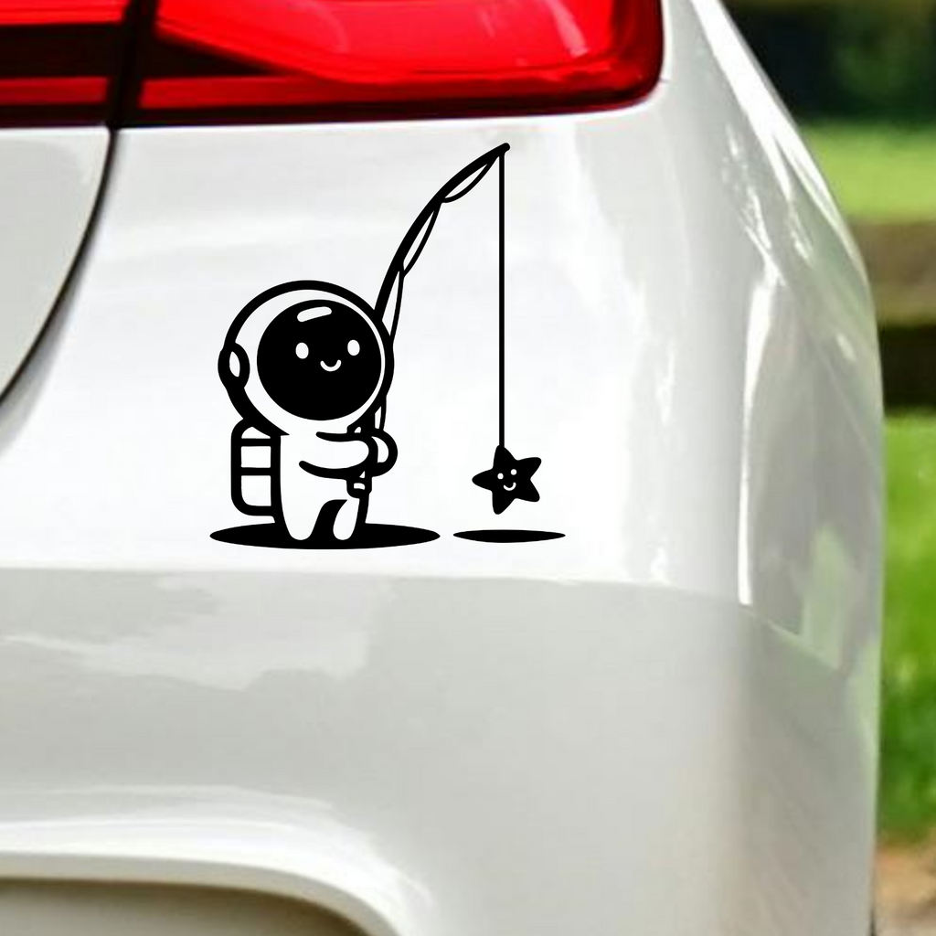 Black astronaut fishing for a star sticker on white car bodywork.