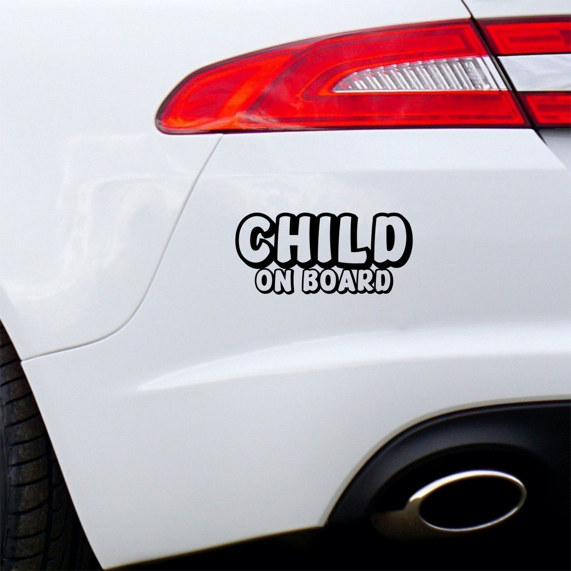 Child On Board outline car sticker shown on white vehicle bodywork