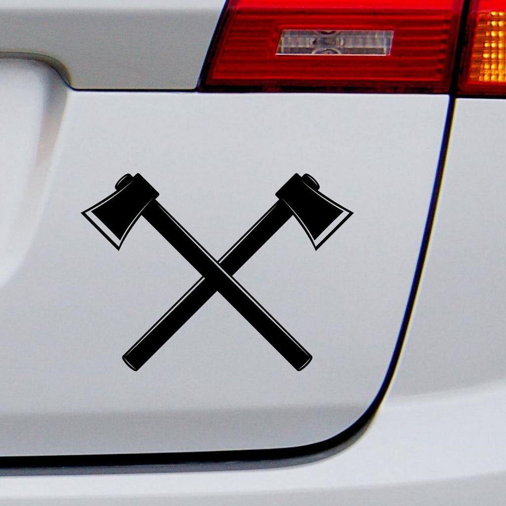 Black crossed camping axes decal on a white vehicle tailgate.
