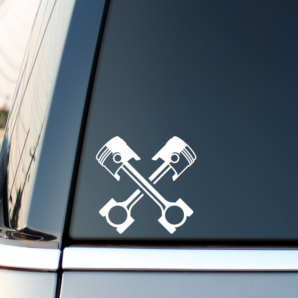 Crossed Pistons vinyl decal for car, van or camper.