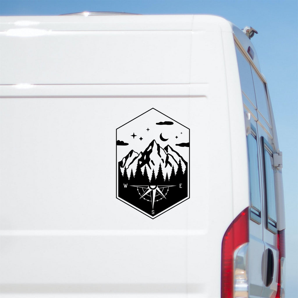 Mountain Compass caravan sticker on a white van