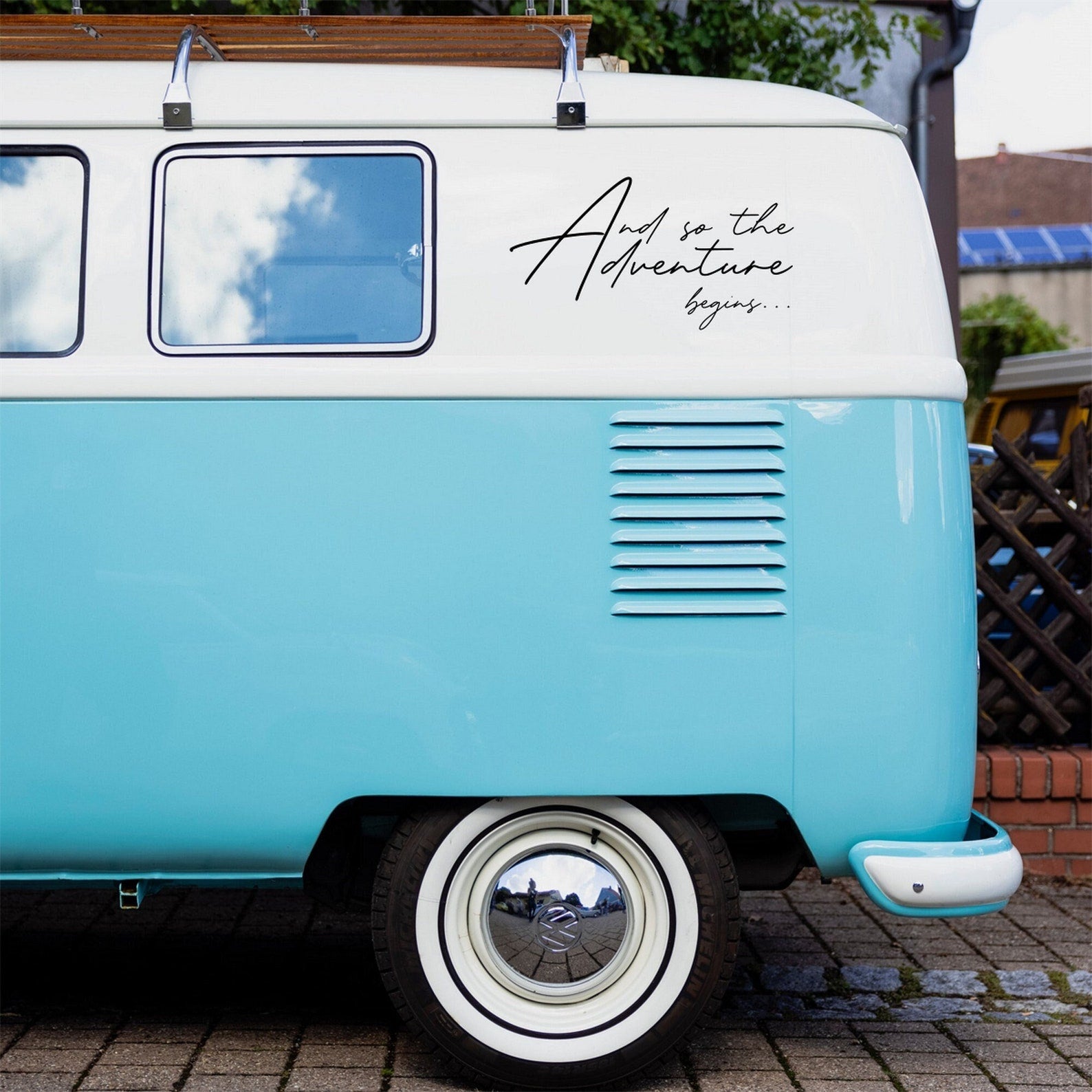 And So The Adventure Begins caravan sticker on a blue van