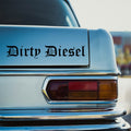 Black Dirty Diesel car sticker in gothic lettering on the rear panel of a pale blue classic car.