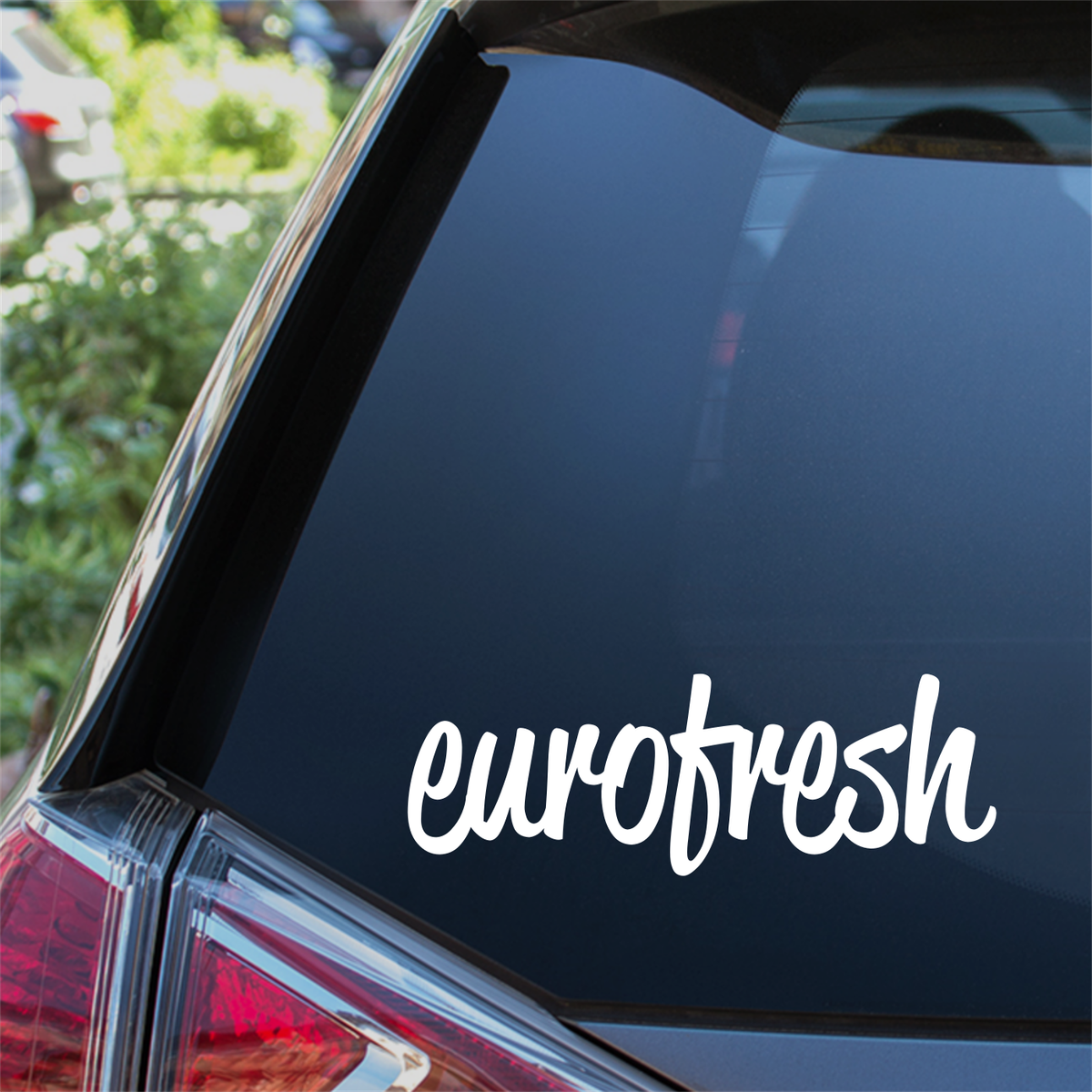 Eurofresh Solid Script Car Sticker in white on a vehicle window.
