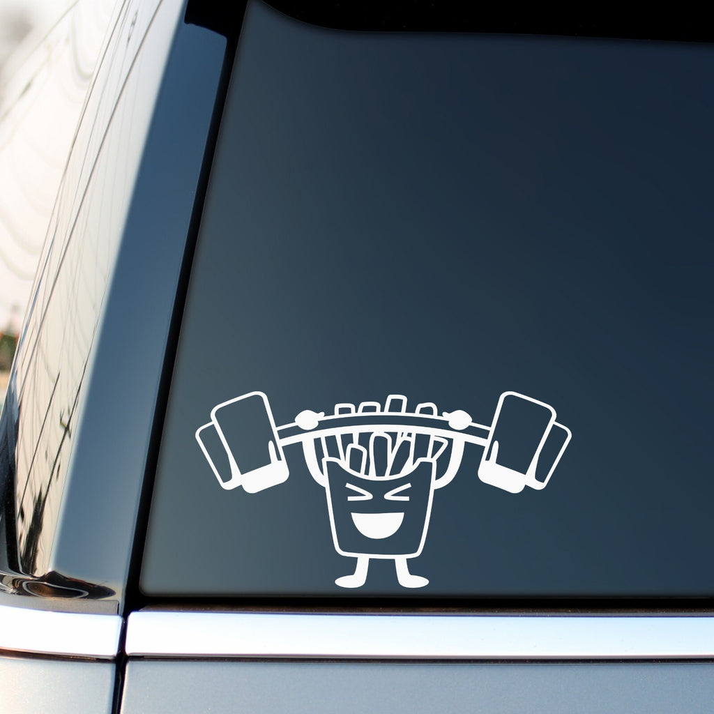 White french fries barbell sticker on a vehicle side window.