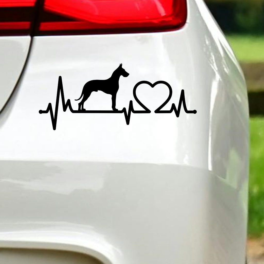 Black great dane heartbeat sticker on white car bodywork beneath a rear light.