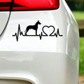 Black great dane heartbeat sticker on white car bodywork beneath a rear light.