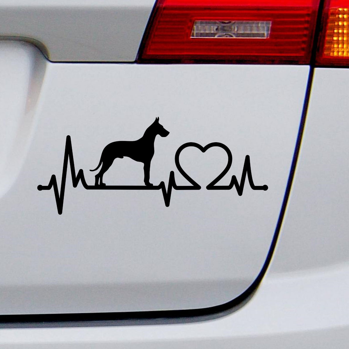 Black great dane heartbeat decal on a white vehicle tailgate.