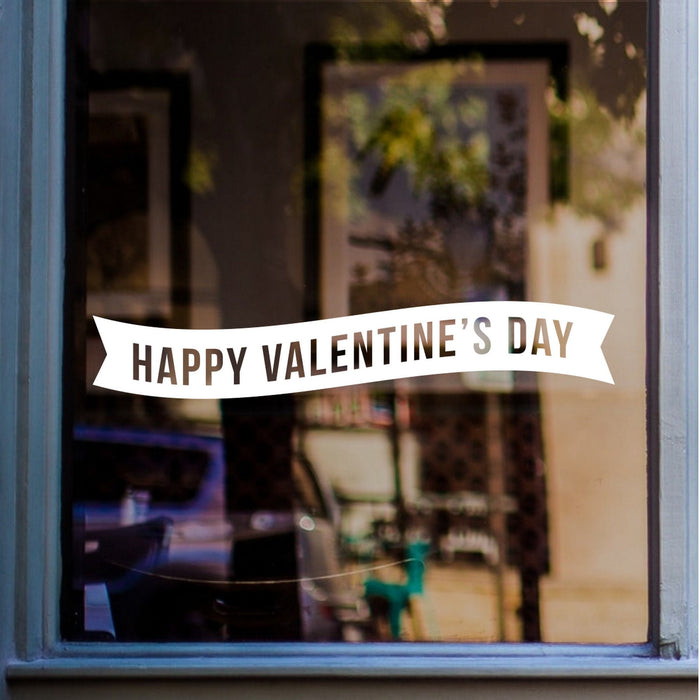 Happy Valentine’s Day lettering window sticker displayed on glass