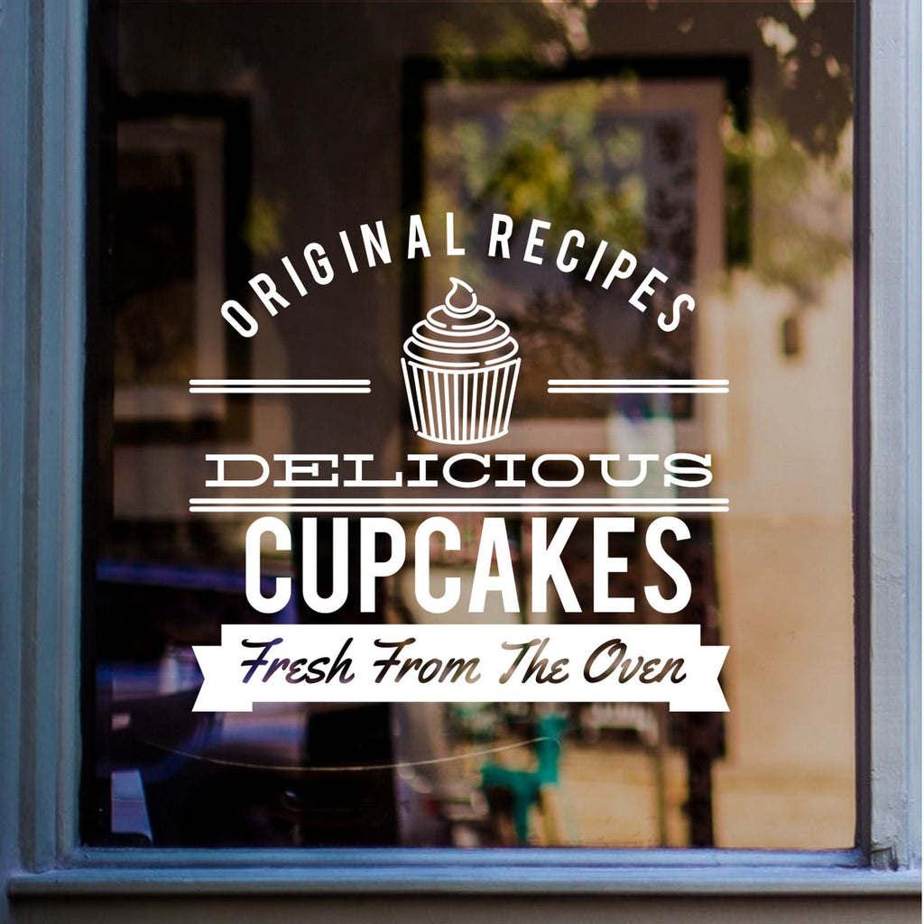 Delicious Cupcakes bakery window sticker displayed on glass