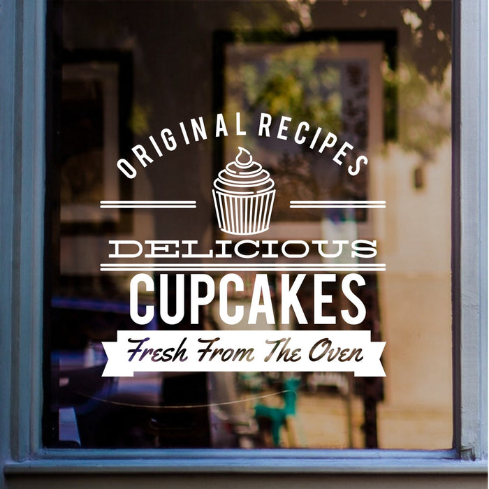 Delicious Cupcakes bakery window sticker displayed on glass