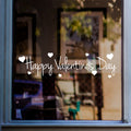 Happy Valentine’s Day window sticker displayed on glass