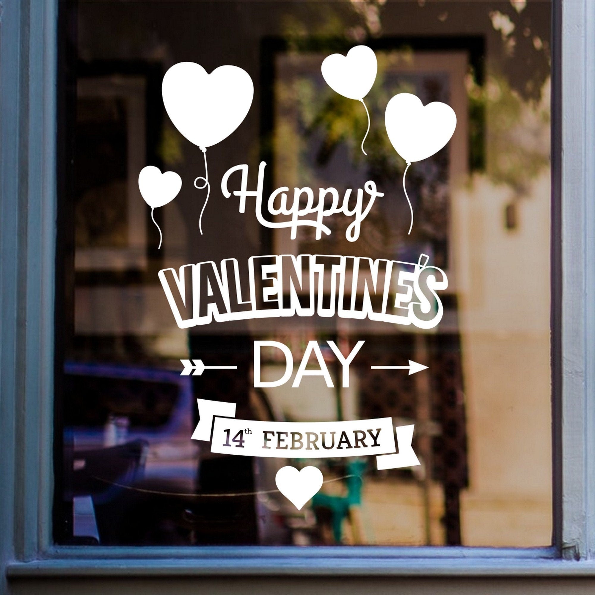 Happy Valentine’s Day vertical window sticker displayed on glass