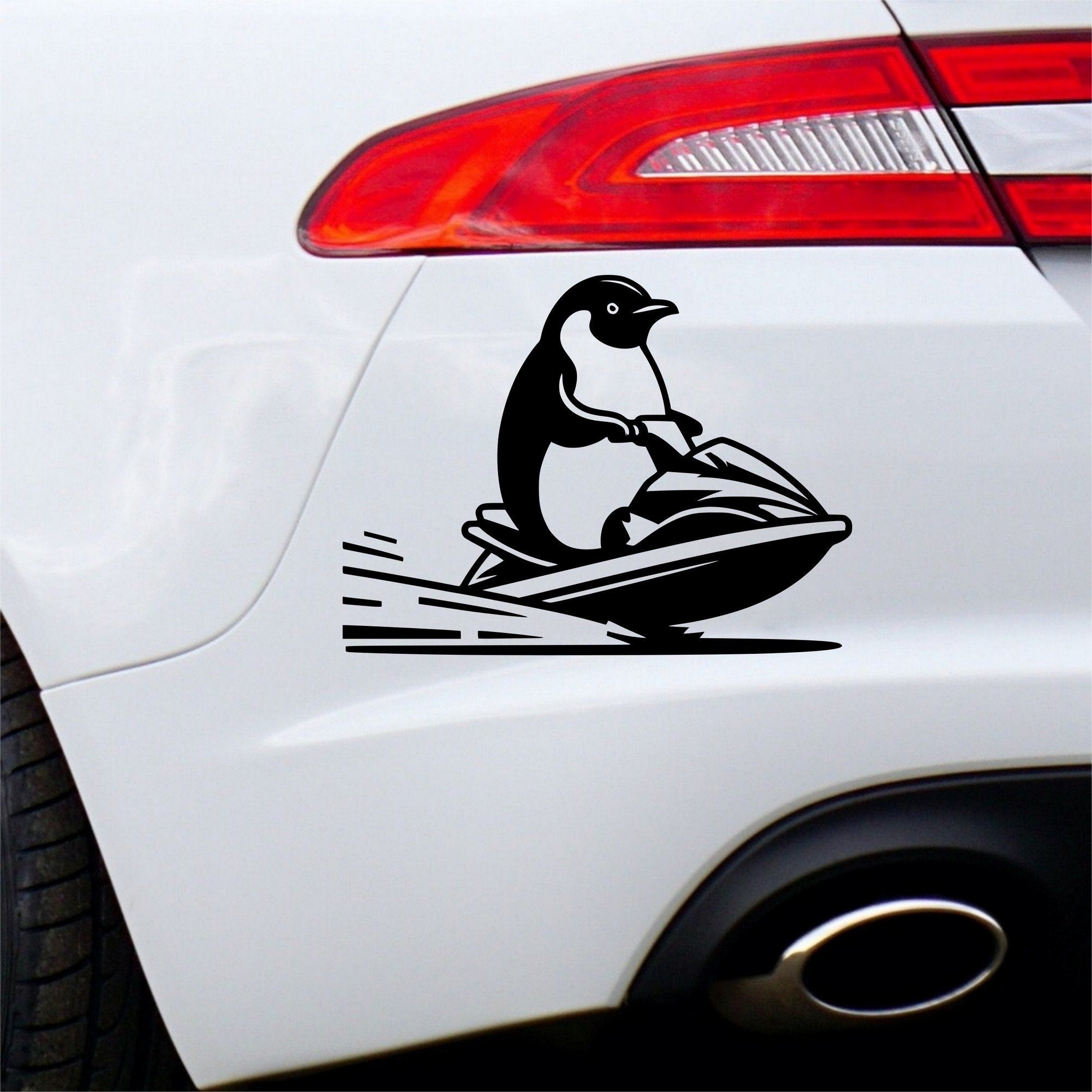 Penguin on a jet ski vinyl car sticker design 2 main product image