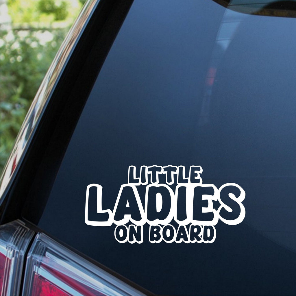 Little Ladies On Board outline car sticker shown on a dark vehicle window