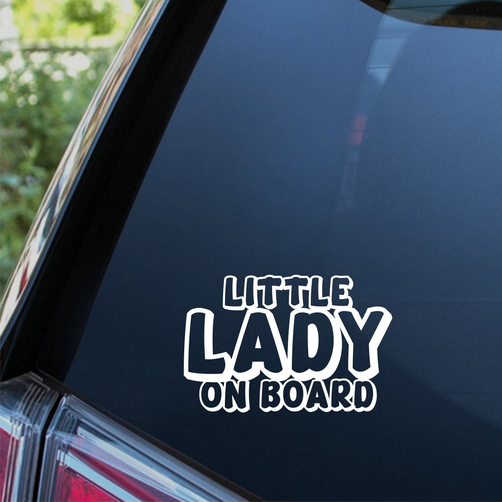 Little Lady On Board outline car sticker shown on a dark vehicle window