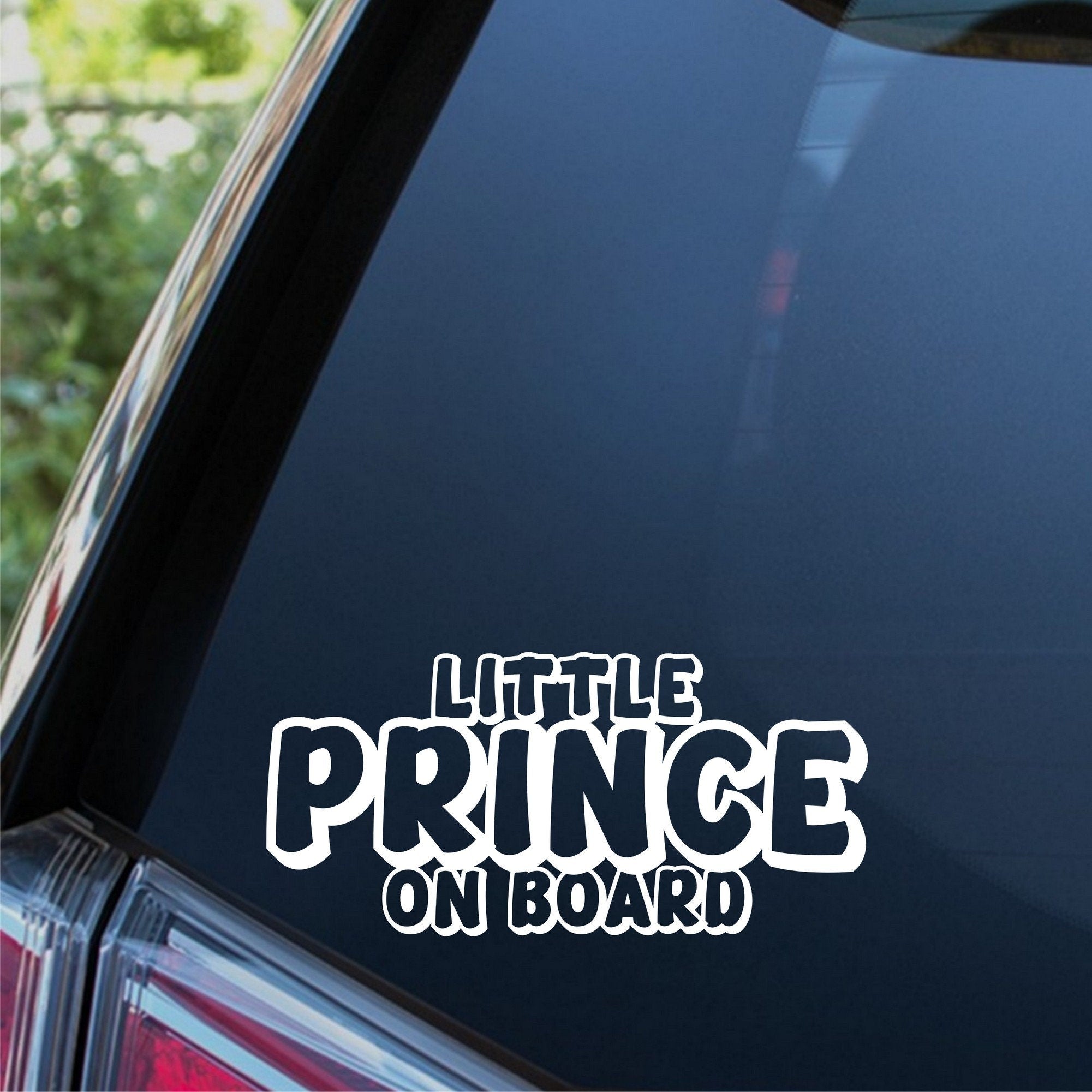 Little Prince On Board outline car sticker shown on a dark vehicle window