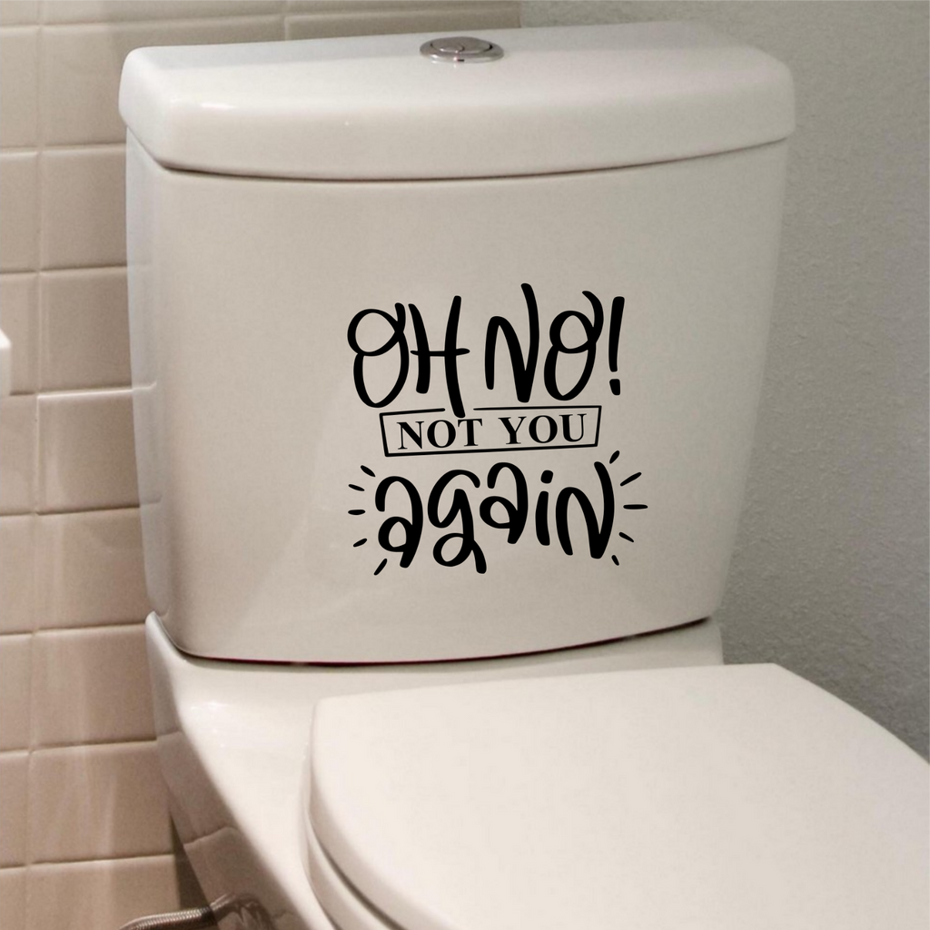 Black Oh No Not You Again sticker on a white toilet cistern.