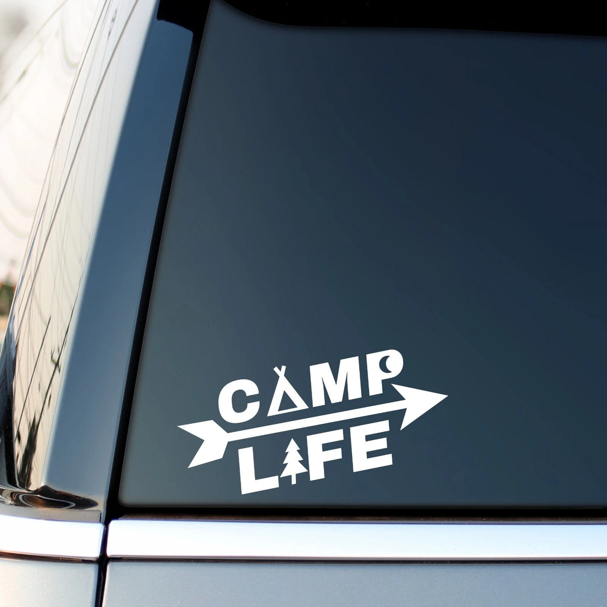 Camp Life Arrow vinyl sticker shown fitted to a dark vehicle window.
