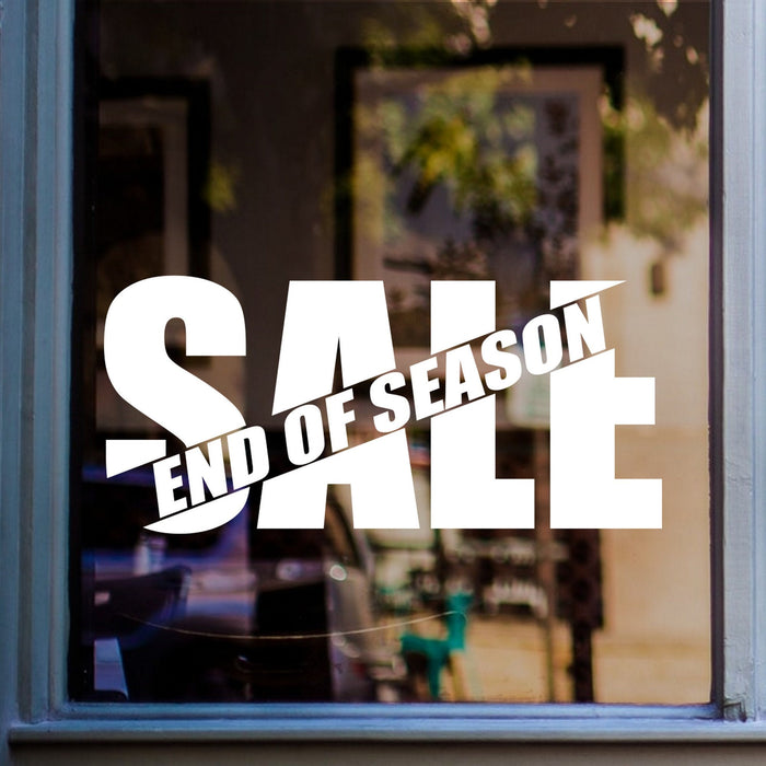 End of Season Sale Window Sticker shown on a shop window