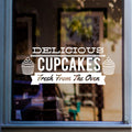 Delicious Cupcakes Bakery Window Sticker displayed on a shop window