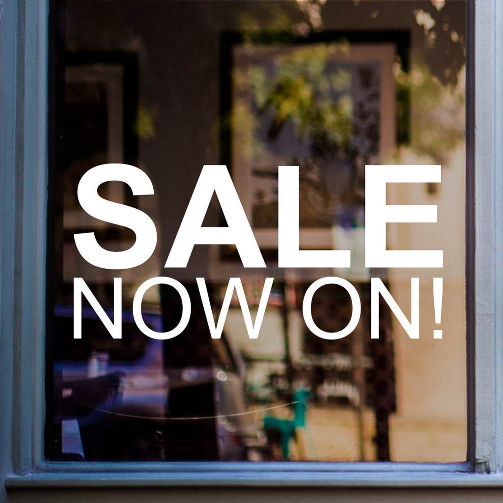 Sale Now On Shop Window Sticker shown on a shop window