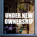 Under New Ownership Shop Window Sticker displayed on a shop window