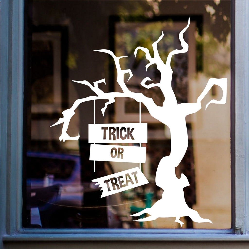 Trick or Treat Creepy Tree Window Sticker displayed on a window