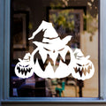 Halloween Pumpkin Window Sticker displayed on a window