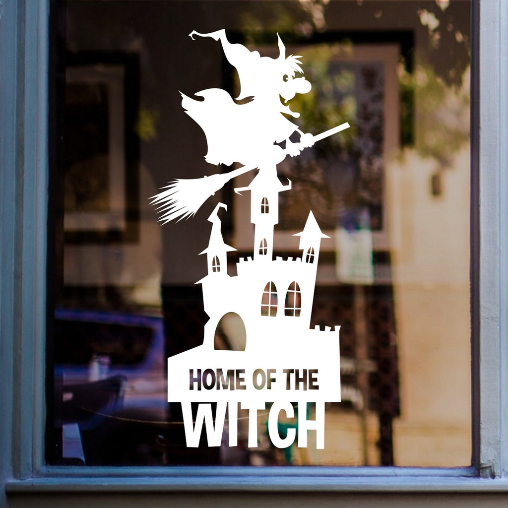 Home of the Witch Halloween Window Sticker shown on a shop window